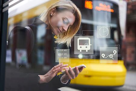 Woman using a MaaS platform Woman using a MaaS platform