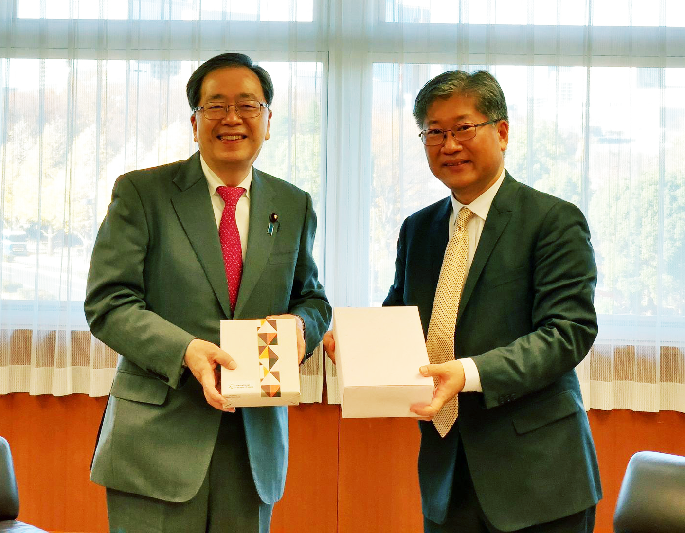 Secretary-General Kim with Tesuo Saito